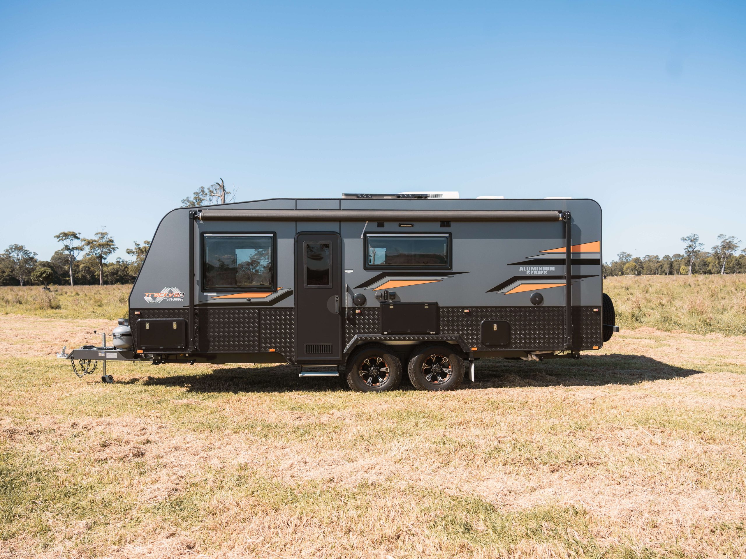 https://trackvan.com.au/wp-content/uploads/2023/11/TAS196-Triple-Bunk-External-1-scaled.jpg