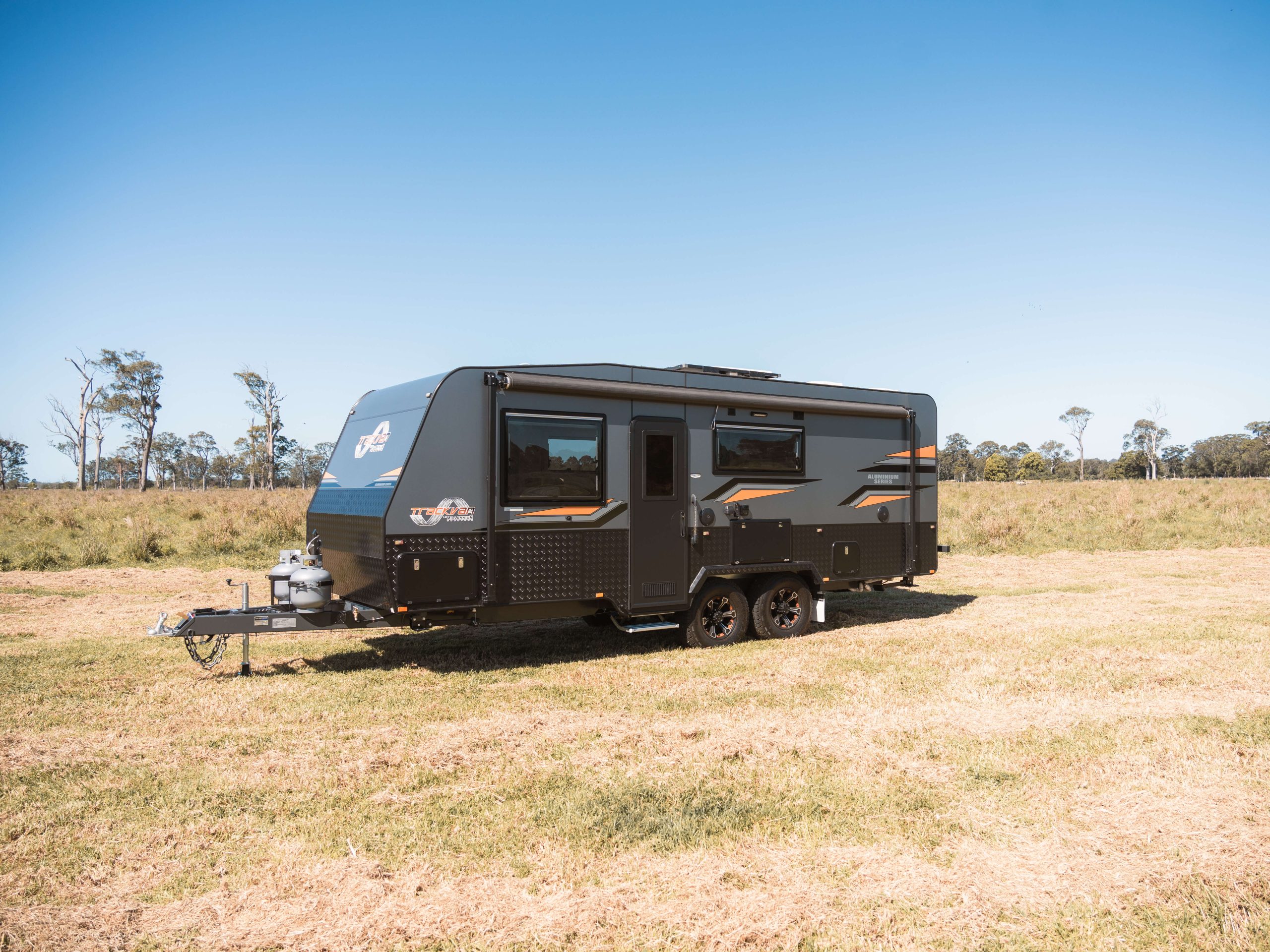 https://trackvan.com.au/wp-content/uploads/2023/11/TAS196-Triple-Bunk-External-2-scaled.jpg